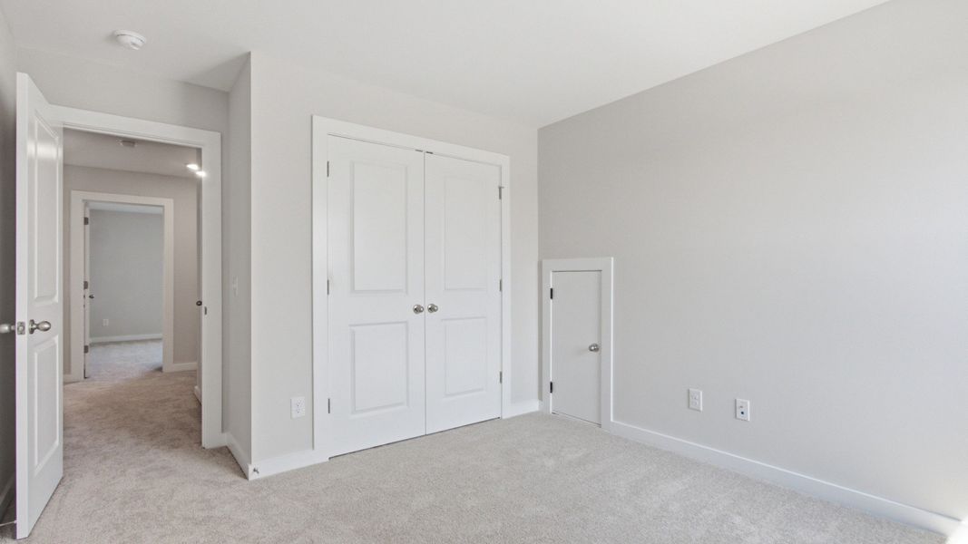 Double-door closet for secondary bedroom