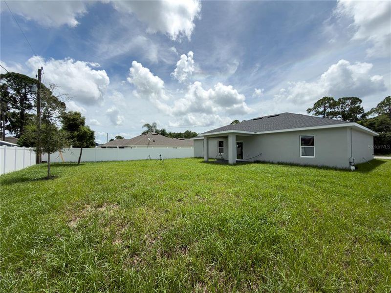 Exterior details and patio area of a home in , Deltona (Image 3).