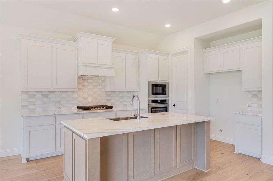 Furnished interior view inside a new home in Windsong Ranch Classic 61, Prosper (Image 9). Furnished interior view inside a new home in Windsong Ranch Classic 61, Prosper (Image 9).