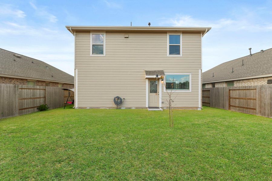 Exterior details and patio area of a home in Tavola: Gulf Coast Collection, New Caney (Image 25).