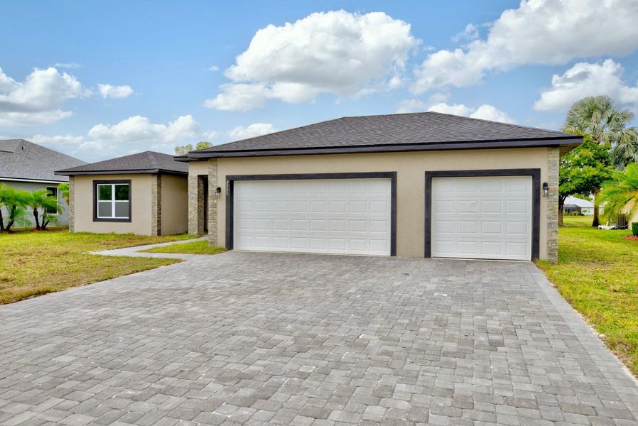 Front exterior of a new home in , Sebring, FL, highlighting curb appeal (Image 16).