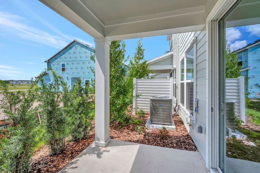 Exterior details and patio area of a home in Waterset Townhomes, Apollo Beach (Image 3). Exterior details and patio area of a home in Waterset Townhomes, Apollo Beach (Image 3).
