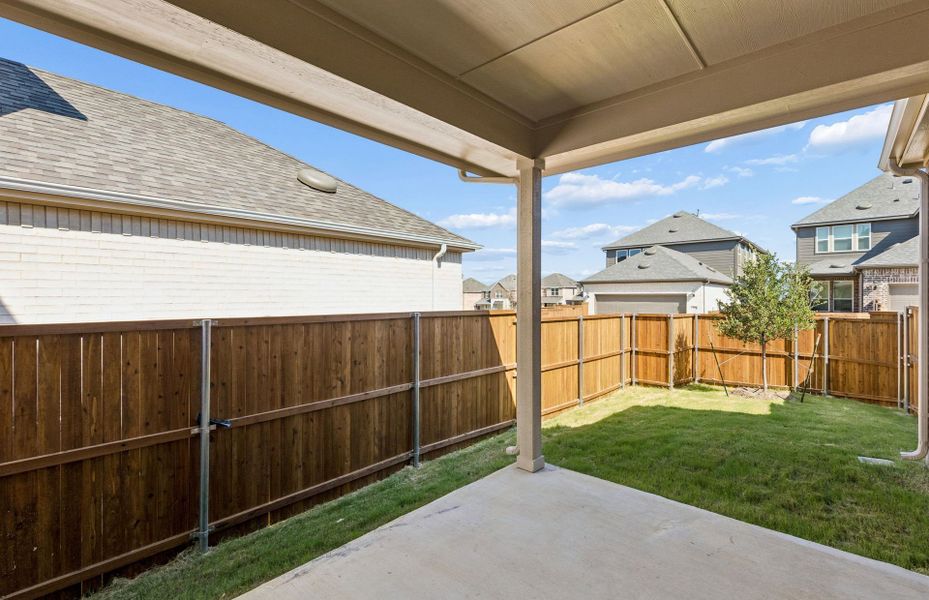 Exterior details and patio area of a home in Pinnacle at Legacy Hills, Celina (Image 2). Exterior details and patio area of a home in Pinnacle at Legacy Hills, Celina (Image 2).