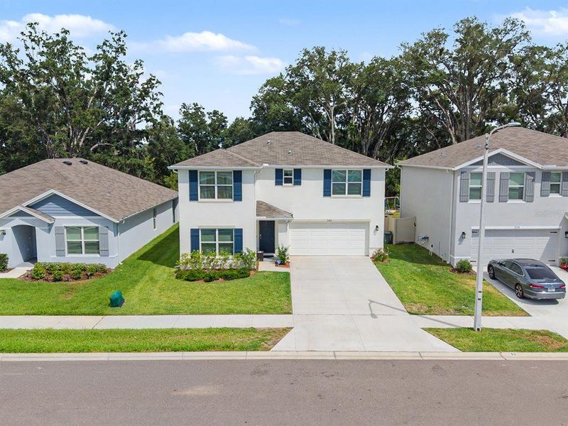 Front exterior of a new home in , Spring Hill, FL, highlighting curb appeal (Image 2). Front exterior of a new home in , Spring Hill, FL, highlighting curb appeal (Image 2).
