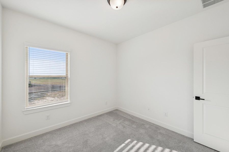 Spacious, unfurnished interior of a new home in Prairieland Village 40' Homesites, Cypress (Image 5).