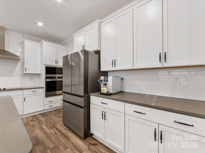 Furnished interior view inside a new home in Towns at Rea Colony, Charlotte (Image 13).