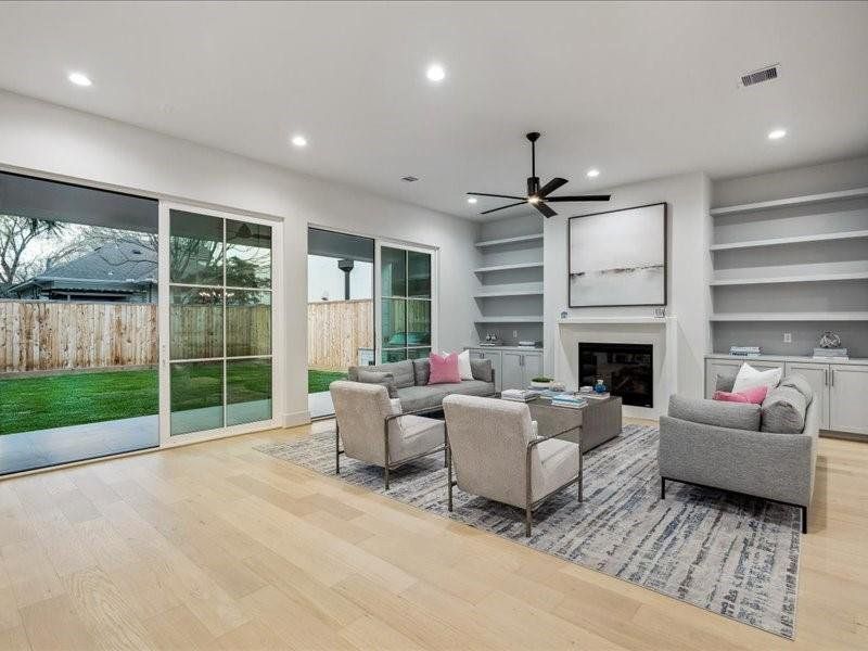 Open concept Living Room with beautiful beautiful sliders