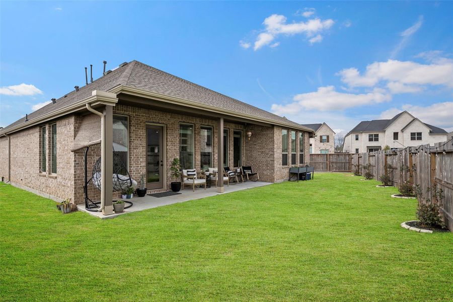 Exterior details and patio area of a home in The Trails, New Caney (Image 24). Exterior details and patio area of a home in The Trails, New Caney (Image 24).
