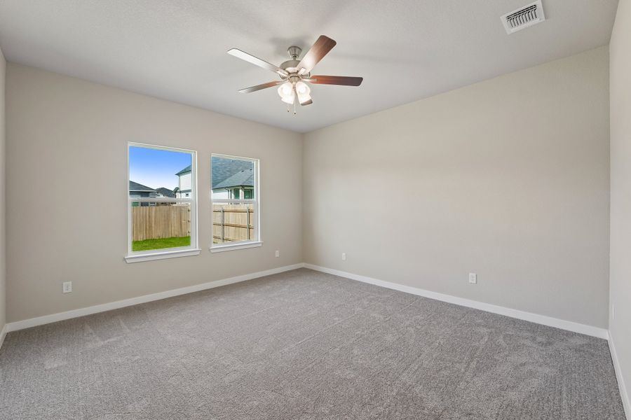 Representative unfurnished interior of a home built from the Guadalupe by Omega Builders in Hillside Village, Temple (Image 9).
