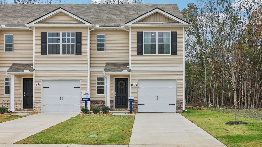 Front exterior of a new home in Saddle Trace Townhomes, Lewisburg, TN, highlighting curb appeal (Image 1). Front exterior of a new home in Saddle Trace Townhomes, Lewisburg, TN, highlighting curb appeal (Image 1).