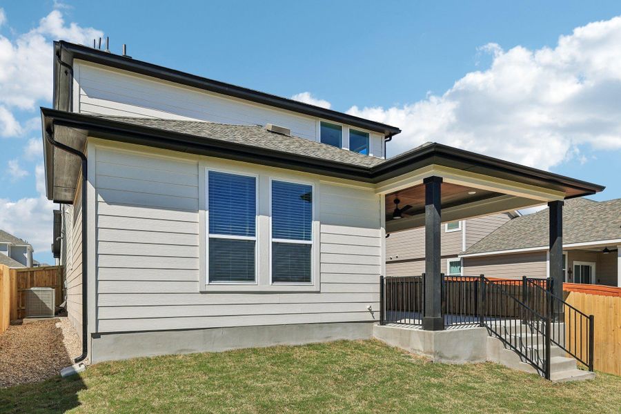 Exterior details and patio area of a home in Lariat, Liberty Hill (Image 24). Exterior details and patio area of a home in Lariat, Liberty Hill (Image 24).