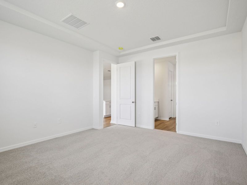 Spacious, unfurnished interior of a new home in Coasterra - Reserve Series, Palmetto (Image 13).