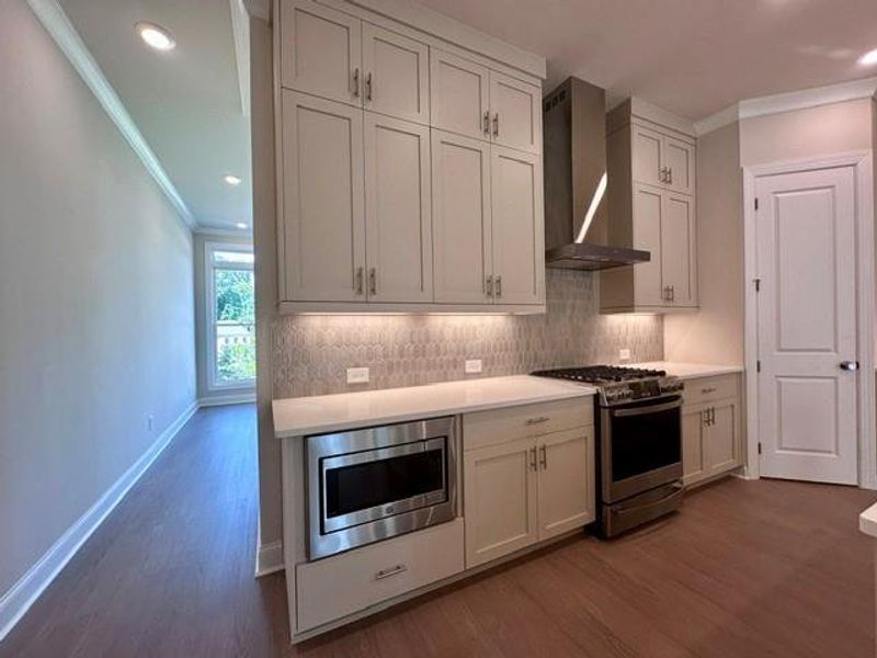 Furnished interior view inside a new home in Ward's Crossing Townhomes, Johns Creek (Image 9). Furnished interior view inside a new home in Ward's Crossing Townhomes, Johns Creek (Image 9).
