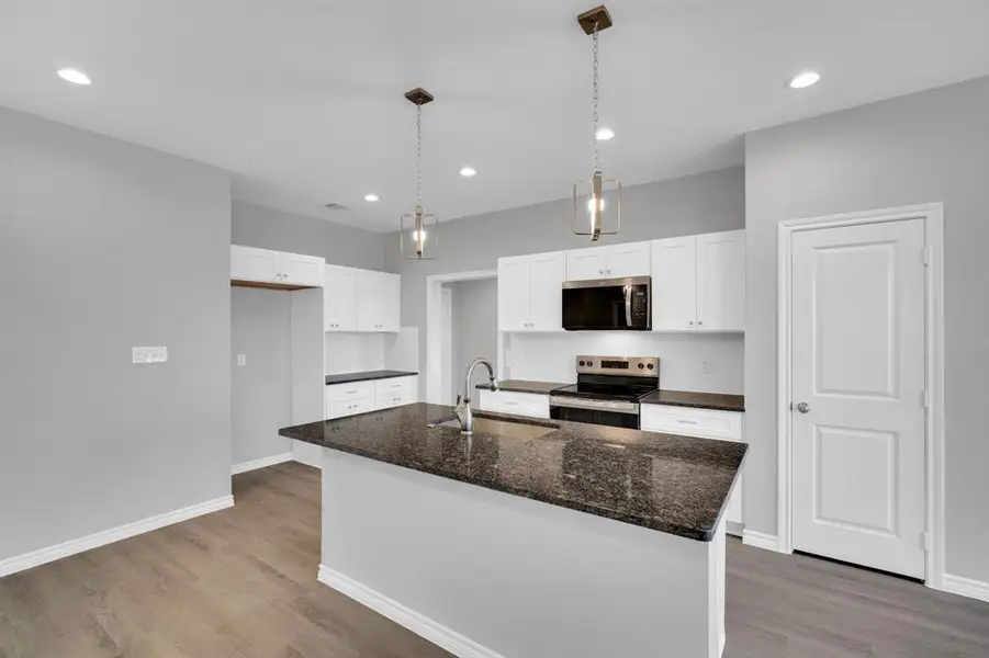 Furnished interior view inside a new home in , Whitney (Image 10).