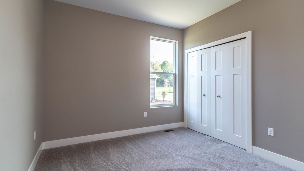 Representative unfurnished interior of a home built from the The Boulder Side Entry by Norfolk Homes in The Grande Estates, Jackson (Image 29).