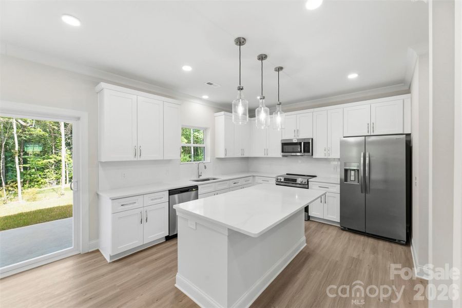Furnished interior view inside a new home in , Statesville (Image 7).