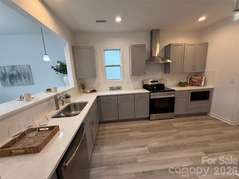 Furnished interior view inside a new home in , Belmont (Image 9).