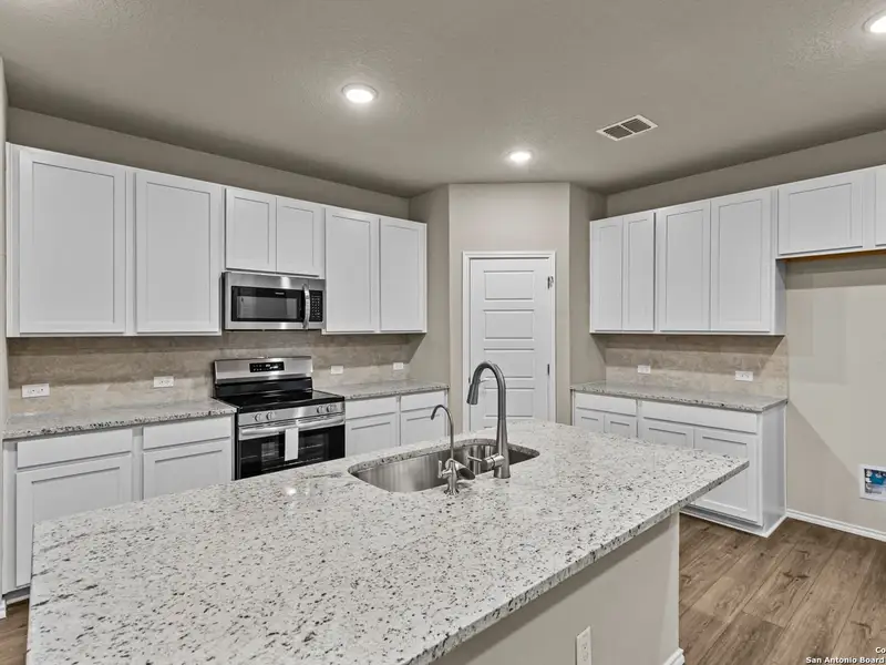 Furnished interior view inside a new home in Royal Crest, San Antonio (Image 9).