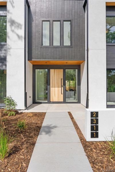 Custom touches throughout with natural light streaming through expansive windows