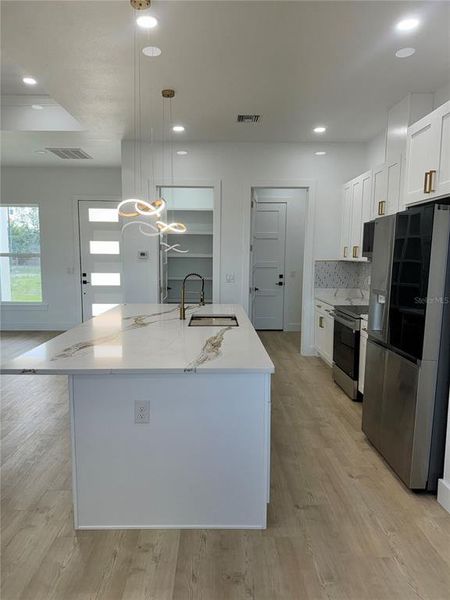 Furnished interior view inside a new home in , Frostproof (Image 9).