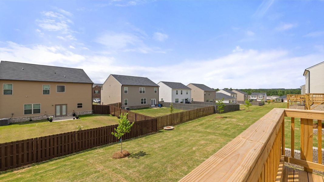 Exterior details and patio area of a home in Brooks Station, Dacula (Image 19).