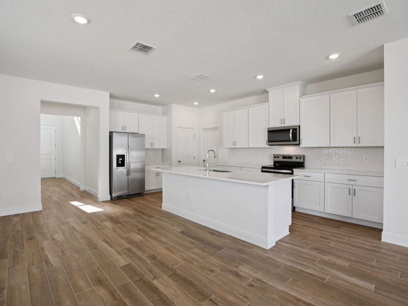 Furnished interior view inside a new home in Cyrene at Minneola - Villas, Minneola (Image 4). Furnished interior view inside a new home in Cyrene at Minneola - Villas, Minneola (Image 4).