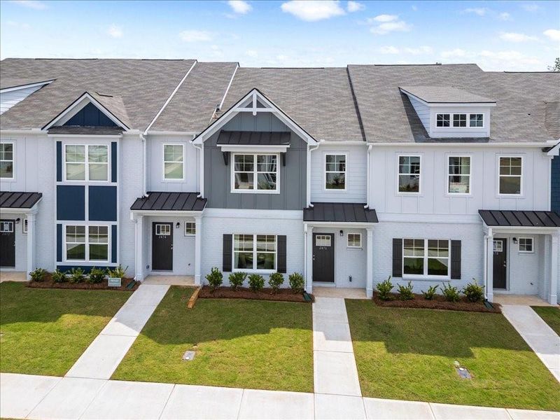 Front exterior of a new home in , Conyers, GA, highlighting curb appeal (Image 1).