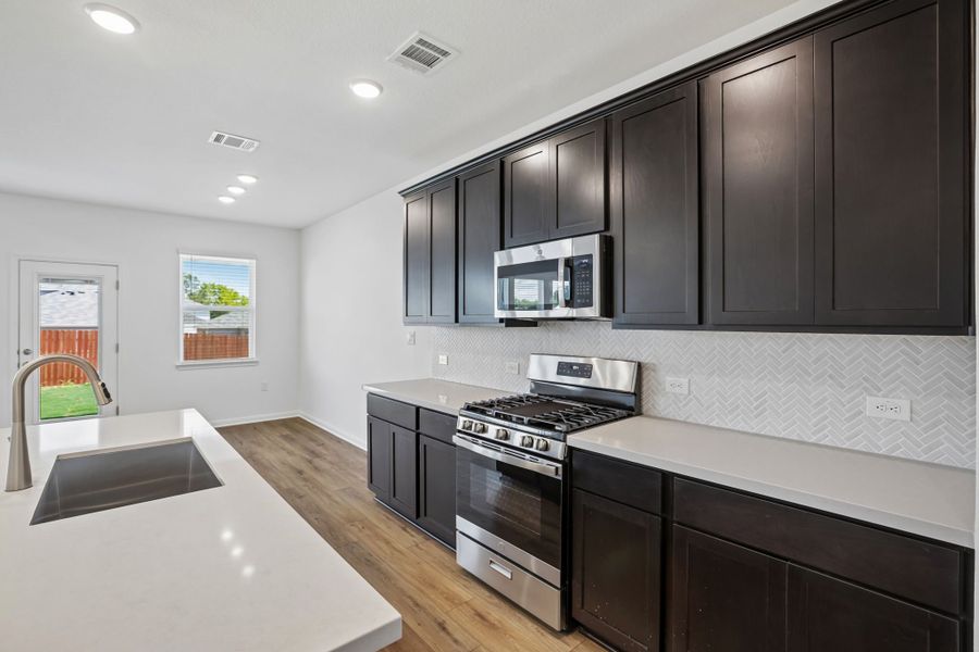 Furnished interior view inside a new home in Lisso, Pflugerville (Image 11).