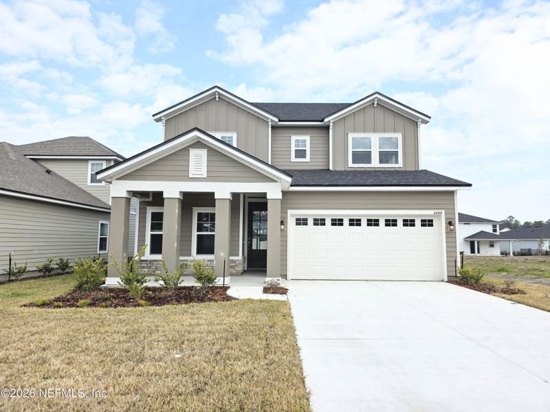 Front exterior of a new home in Hyland Trail, Green Cove Springs, FL, highlighting curb appeal (Image 1). Front exterior of a new home in Hyland Trail, Green Cove Springs, FL, highlighting curb appeal (Image 1).