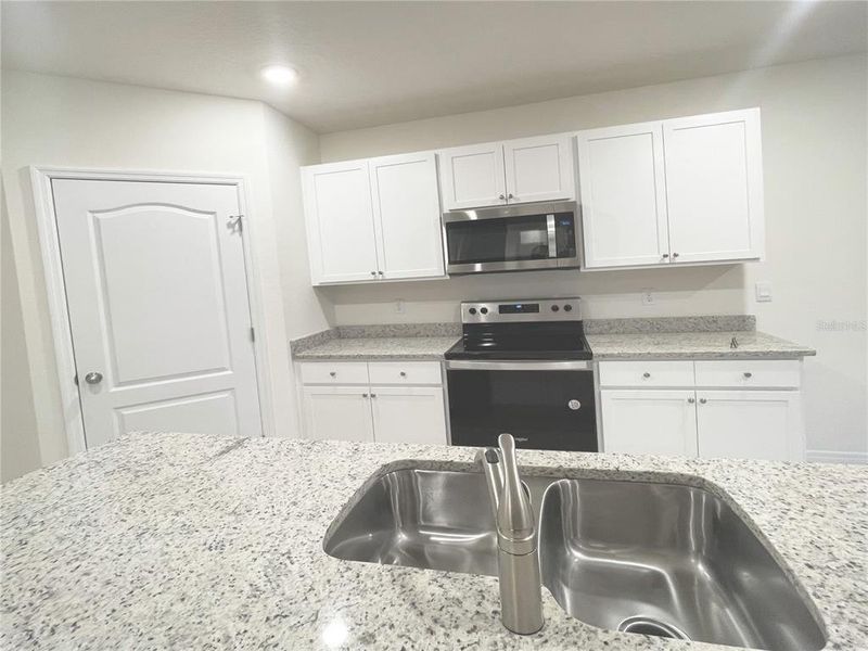 Furnished interior view inside a new home in , Haines City (Image 28).