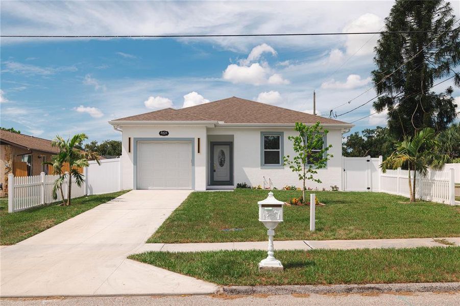 Front exterior of a new home in , Tampa, FL, highlighting curb appeal (Image 1). Front exterior of a new home in , Tampa, FL, highlighting curb appeal (Image 1).