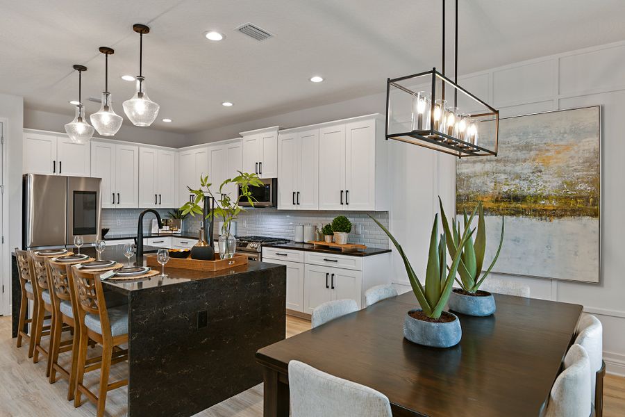 Representative furnished interior of a home built from the Kensington Flex by Risewell Homes in Park View at the Hills, Minneola (Image 9).