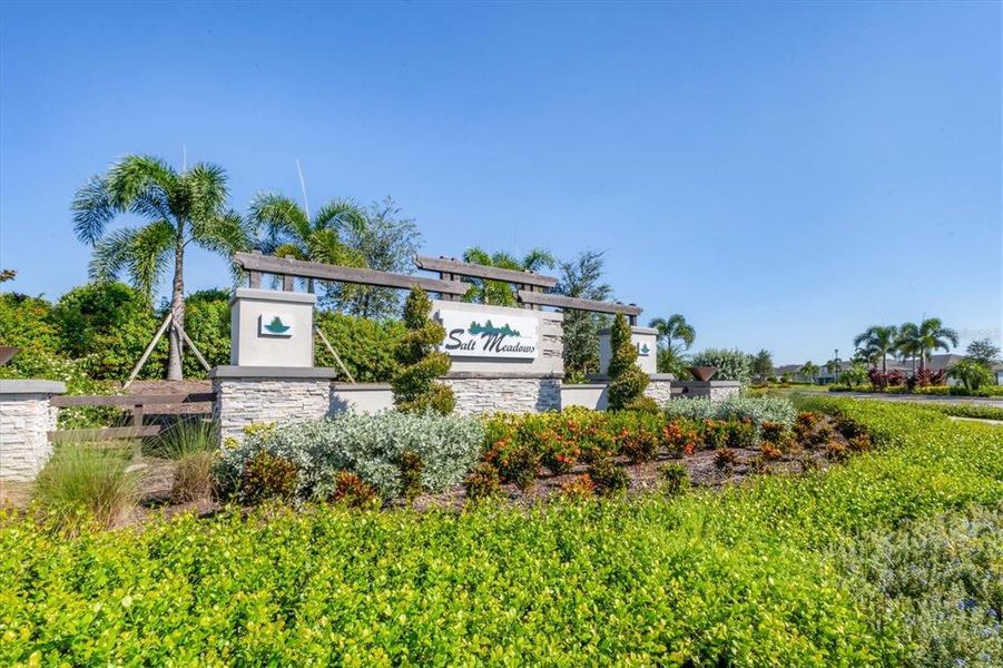 Front exterior of a new home in , Parrish, FL, highlighting curb appeal (Image 22).
