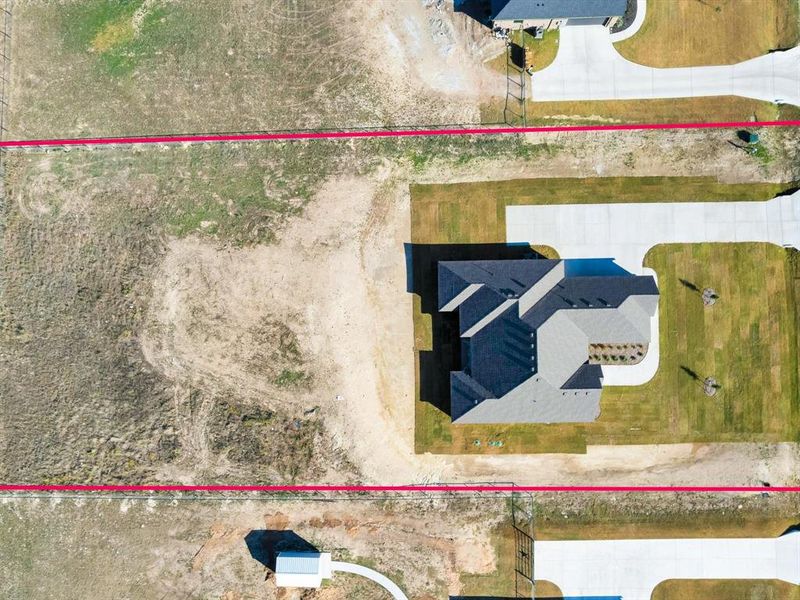 Front exterior of a new home in , Weatherford, TX, highlighting curb appeal (Image 2).