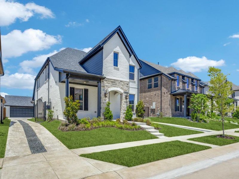 This dream home offers beautiful painted brick paired with stone to create fantastic curb appeal! This dream home offers beautiful painted brick paired with stone to create fantastic curb appeal!