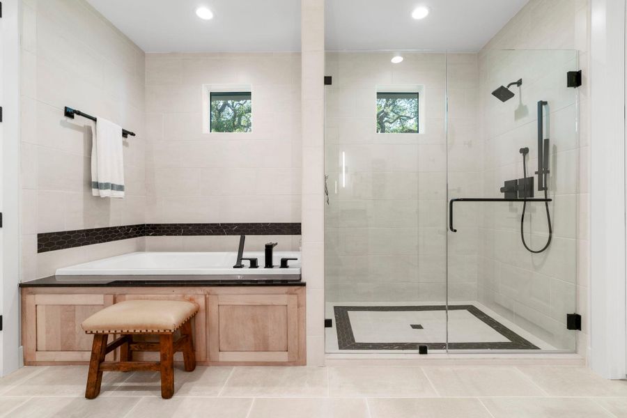 Garden soaking tub and walk-in shower will be a delight in this spa-like owners retreat. Garden soaking tub and walk-in shower will be a delight in this spa-like owners retreat.