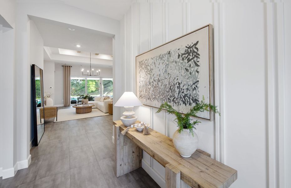 Representative furnished interior of a home built from the Ashby by DiVosta in Emerson Oaks, Vero Beach (Image 7).