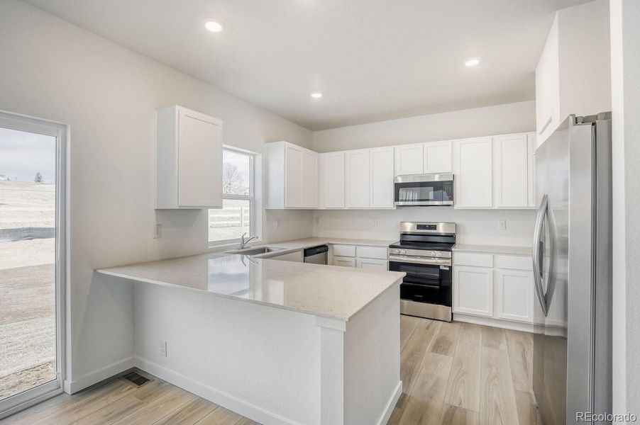 Furnished interior view inside a new home in Prairie Song, Windsor (Image 7).