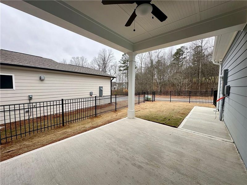 Exterior details and patio area of a home in Marble Tree, Ball Ground (Image 20).
