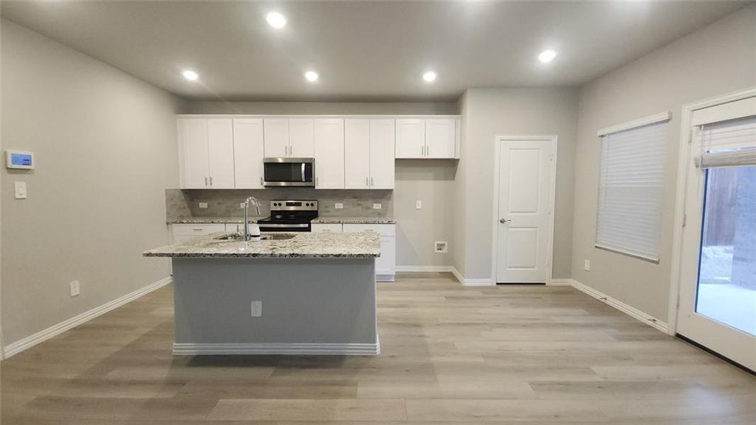 Furnished interior view inside a new home in Bryant Farms, Melissa (Image 4).