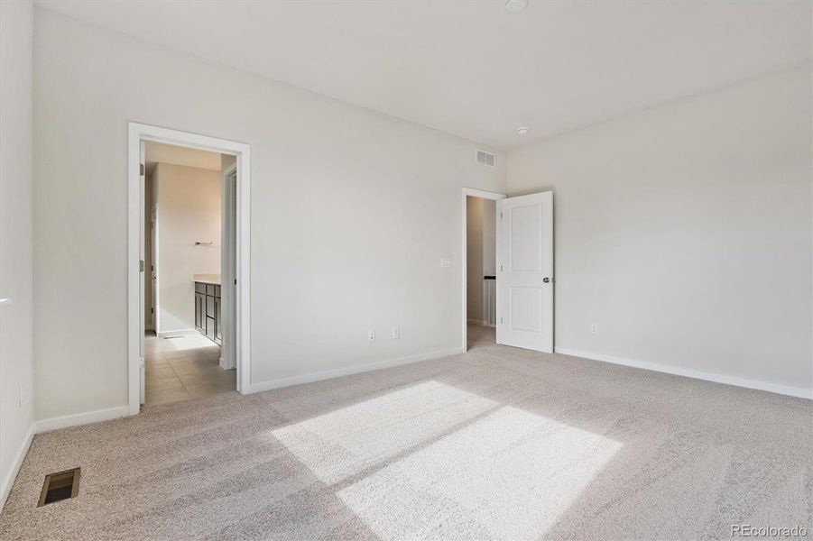 Spacious, unfurnished interior of a new home in Floret Collection at Parkdale Commons, Lafayette (Image 17).