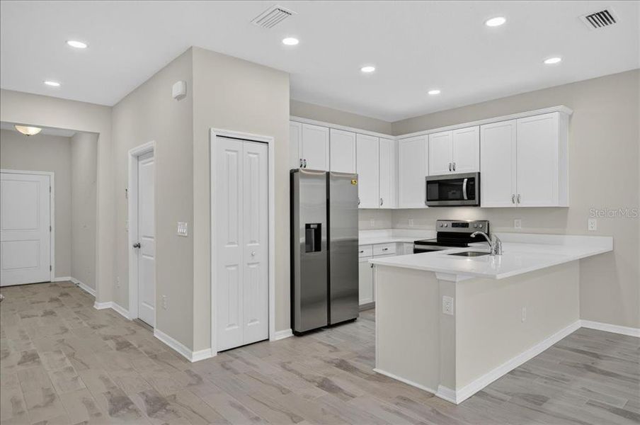 Furnished interior view inside a new home in Calusa Creek, Riverview (Image 11).