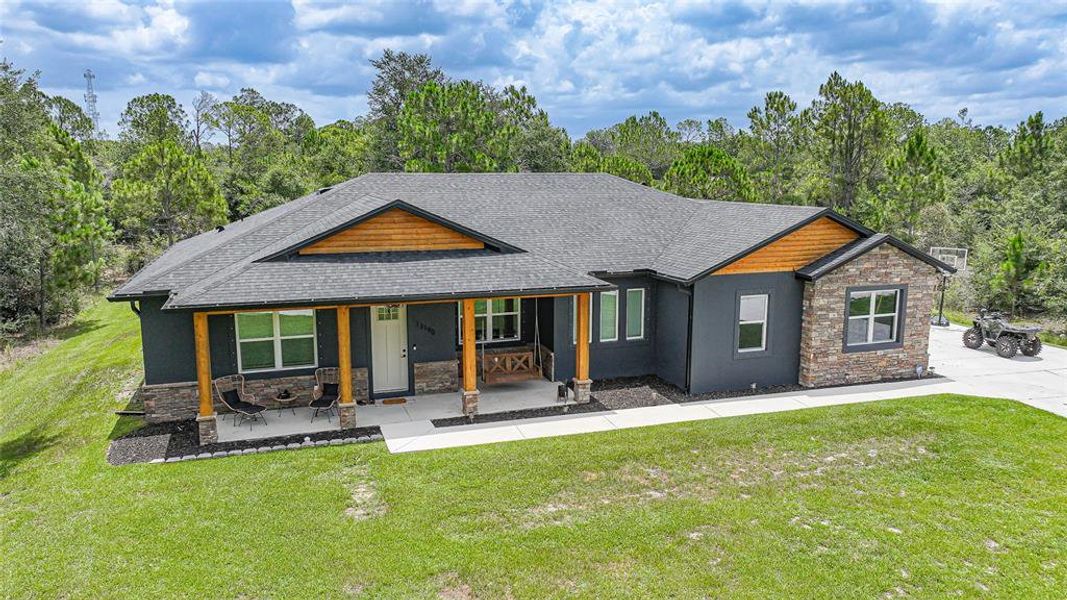 Front exterior of a new home in , Punta Gorda, FL, highlighting curb appeal (Image 2). Front exterior of a new home in , Punta Gorda, FL, highlighting curb appeal (Image 2).