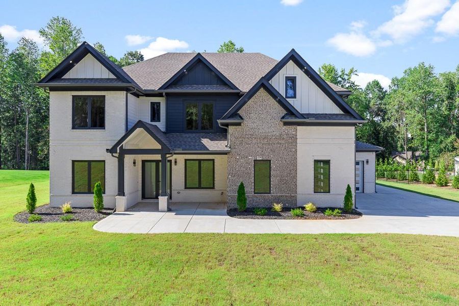 Front exterior of a new home in , Jefferson, GA, highlighting curb appeal (Image 2).