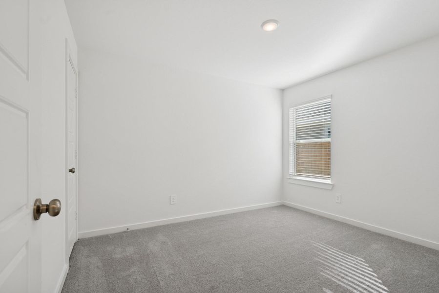 Spacious, unfurnished interior of a new home in Pinewood at Grand Texas, New Caney (Image 24).