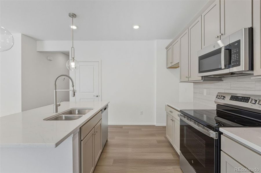 Furnished interior view inside a new home in The Cottages Collection at Ridgeline Vista, Brighton (Image 6).
