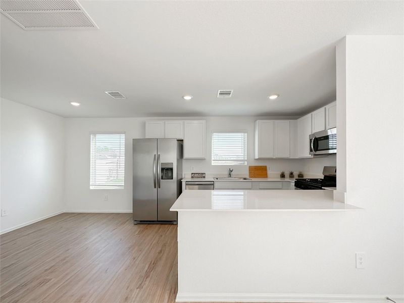 Furnished interior view inside a new home in Ladera Trails: Cottage Collection, Conroe (Image 3). Furnished interior view inside a new home in Ladera Trails: Cottage Collection, Conroe (Image 3).