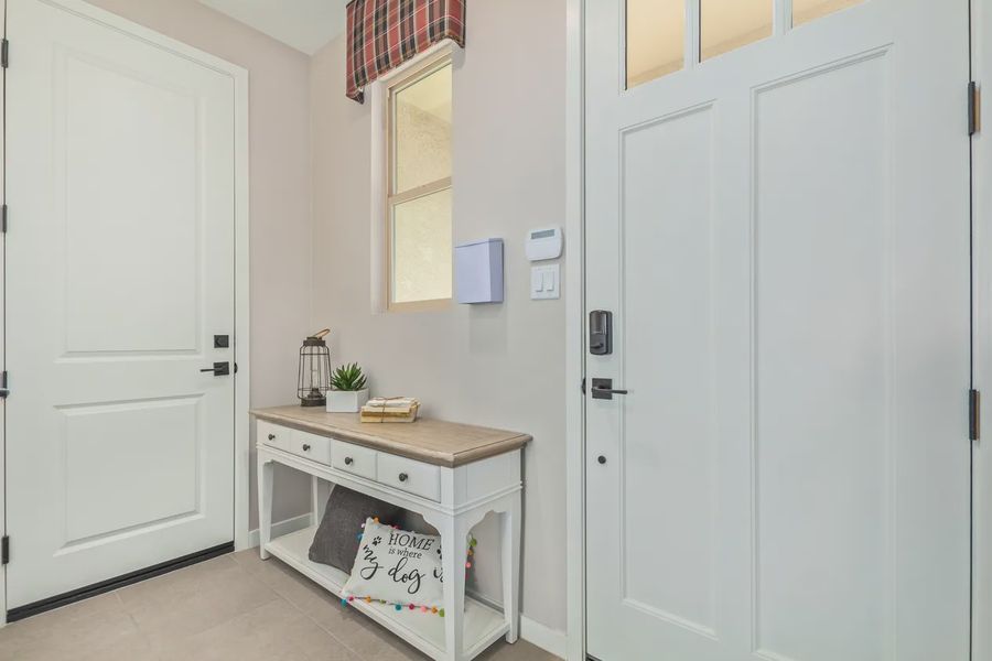 Representative furnished interior of a home built from the 1603 by Elliott Homes in Acacia at Santana, Yuma (Image 6).