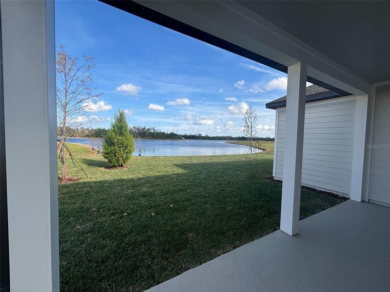 Exterior details and patio area of a home in Ardisia Park Estate, New Smyrna Beach (Image 26).