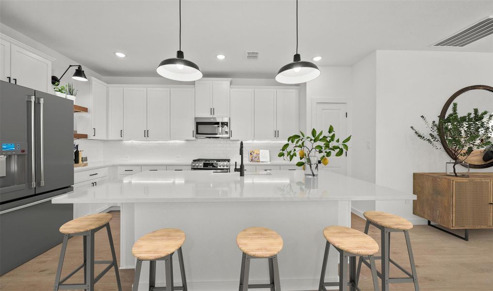 Lovely island kitchen (*Photo not of actual home and used for illustration purposes only.) Lovely island kitchen (*Photo not of actual home and used for illustration purposes only.)